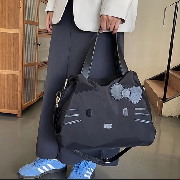 Hello Kitty Black Tote with Bow Accent duffle crossbody bag removable strap - Picture 16 of 16